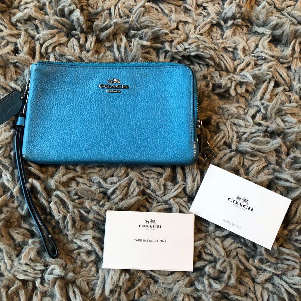 Pretty blue Coach clutch with authentic cards